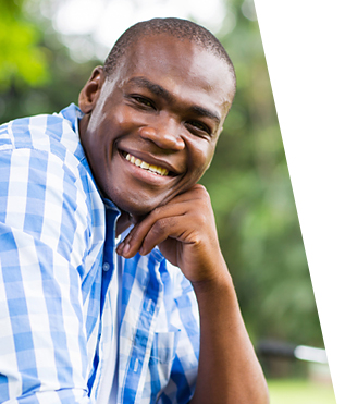 Man smiling following recovery treatment for alcoholism
