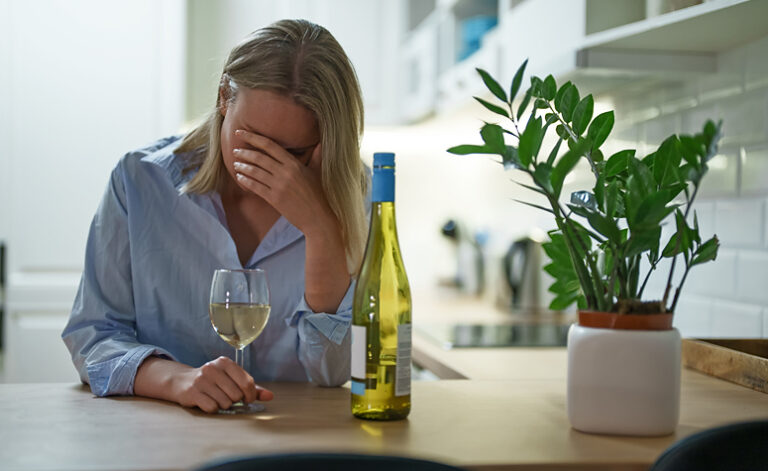 Alcoholic parent drinking through the day