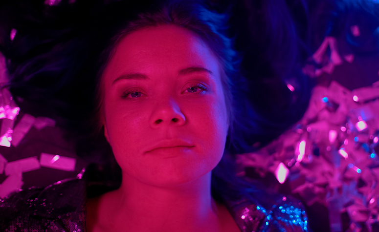 Drugged up lady in night club lying on the floor overdosing