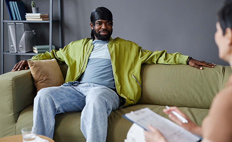 Patient in experiential therapy session at treatment for addiction center