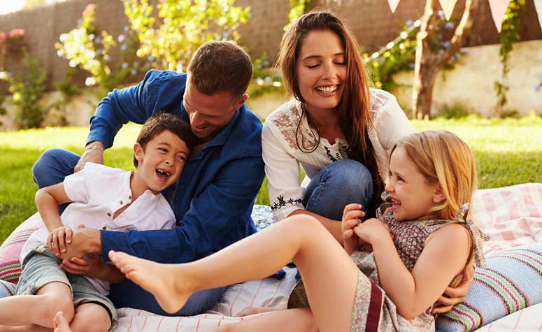 Family outside enjoying the joys of recovery from addiction