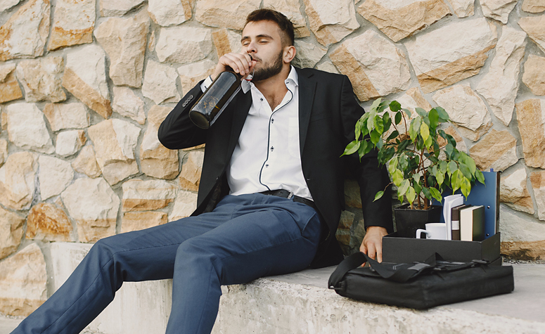 Depressed man fired from work sat drunk outside