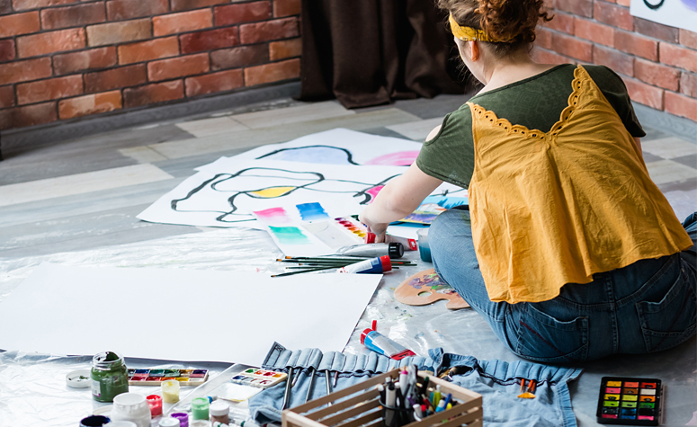 Patient in rehab participating in art therapy as part of their treatment plan