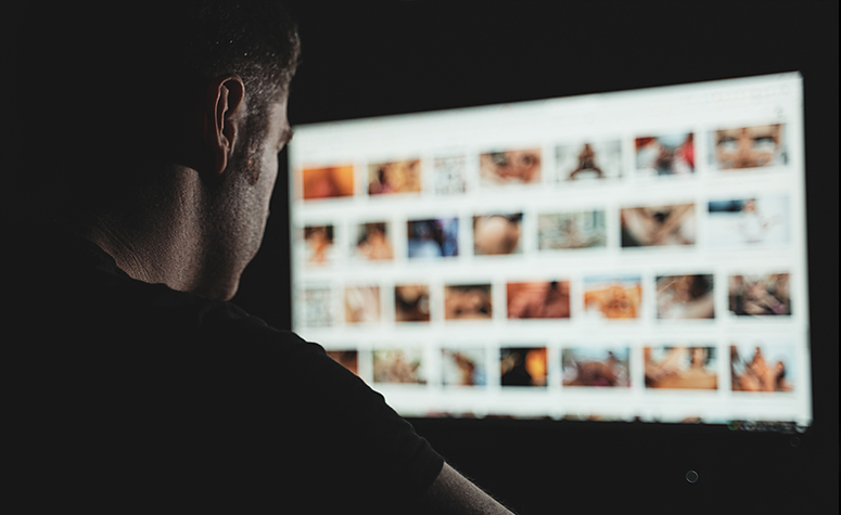 Man addicted to porn browsing online images