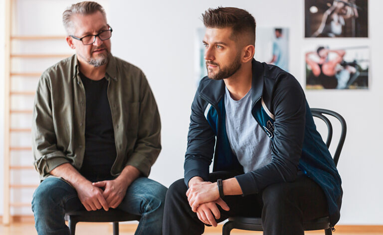 Man in behavioural therapy session to treat his exercise addiction