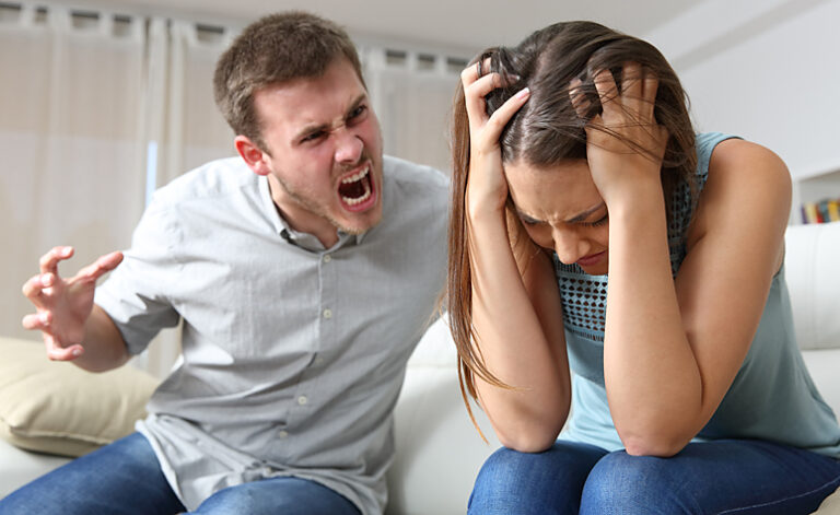 Man with anger management issues screaming and arguing with his wife