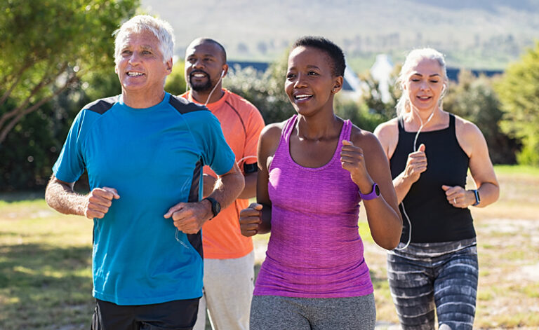 Group in recovery taking a gentle jog to improve their physical health