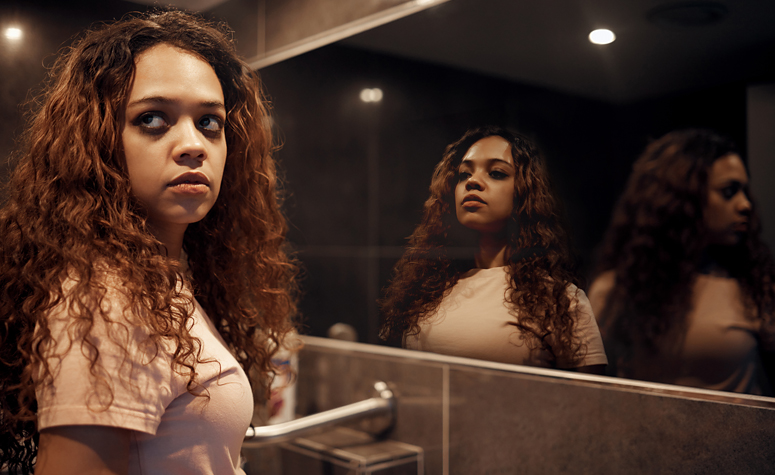 Woman demonstrating the typical symptoms associated with bipolar disorder