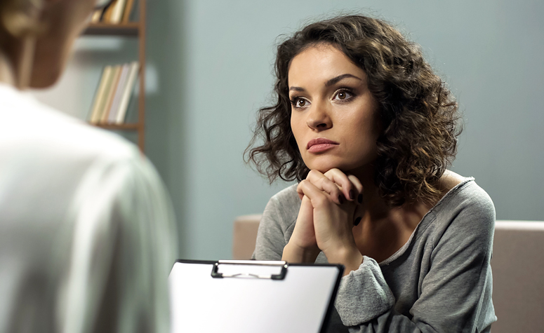 BDD patient talking part in talking therapy with a psychologist