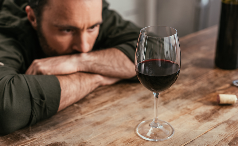 Man showing signs of alcohol dependency