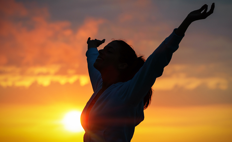 Woman full of joy and freedom following treatment at a residential rehab for her alcohol addiction