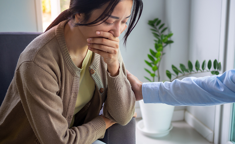 Woman working with an expert trauma therapist