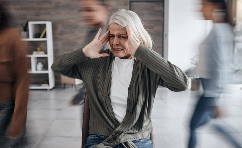 Woman suffering with the symptoms of social anxiety