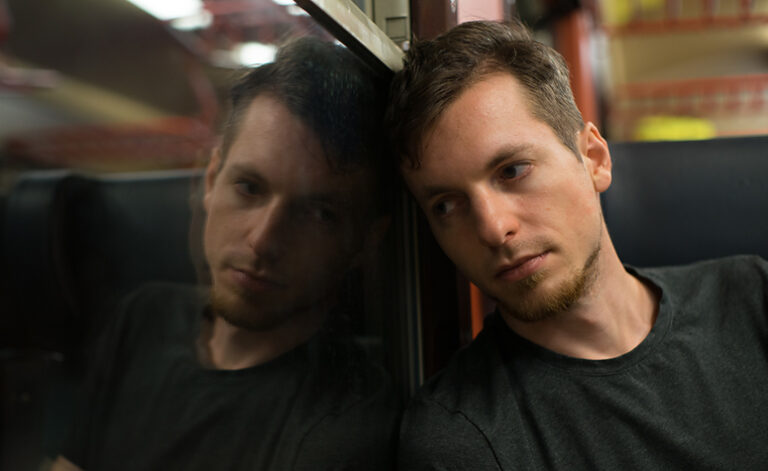 Man struggling with the symptoms of persistent depressive disorder