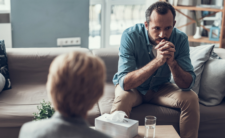 Man working with a psychodynamic therapist