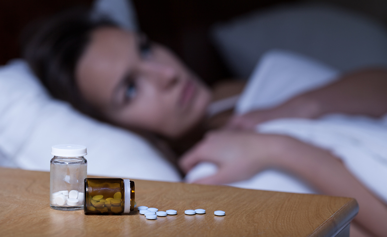 Woman suffering from insomnia and nightmares due to her addiction to Lorazepam